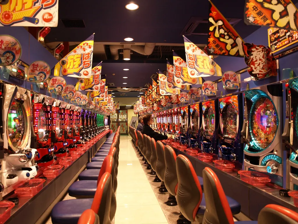 rows of pachinko machines in a Japanese pachinko parlor