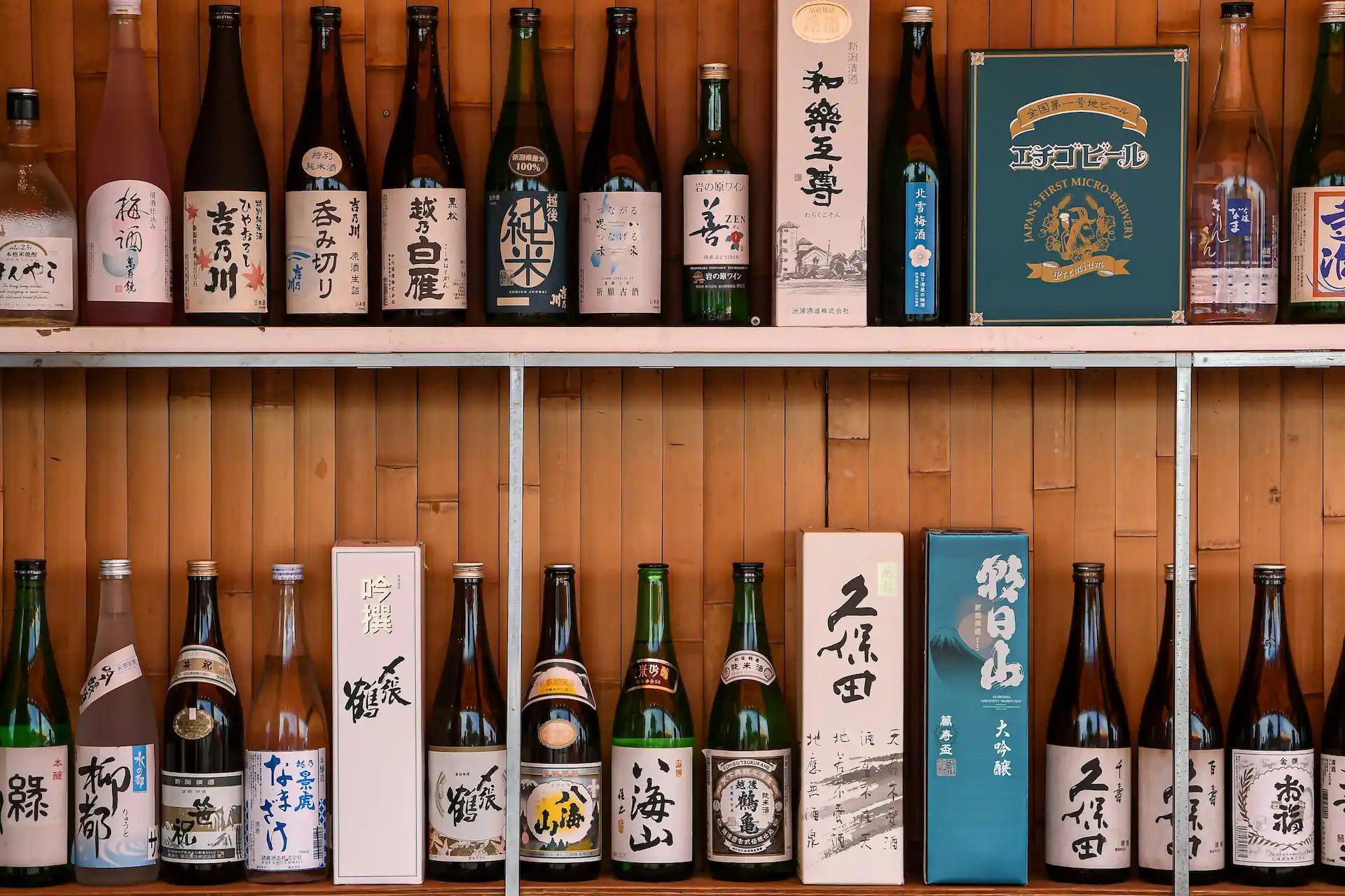 bottles of nihonshu, Japanese rice sake, on display