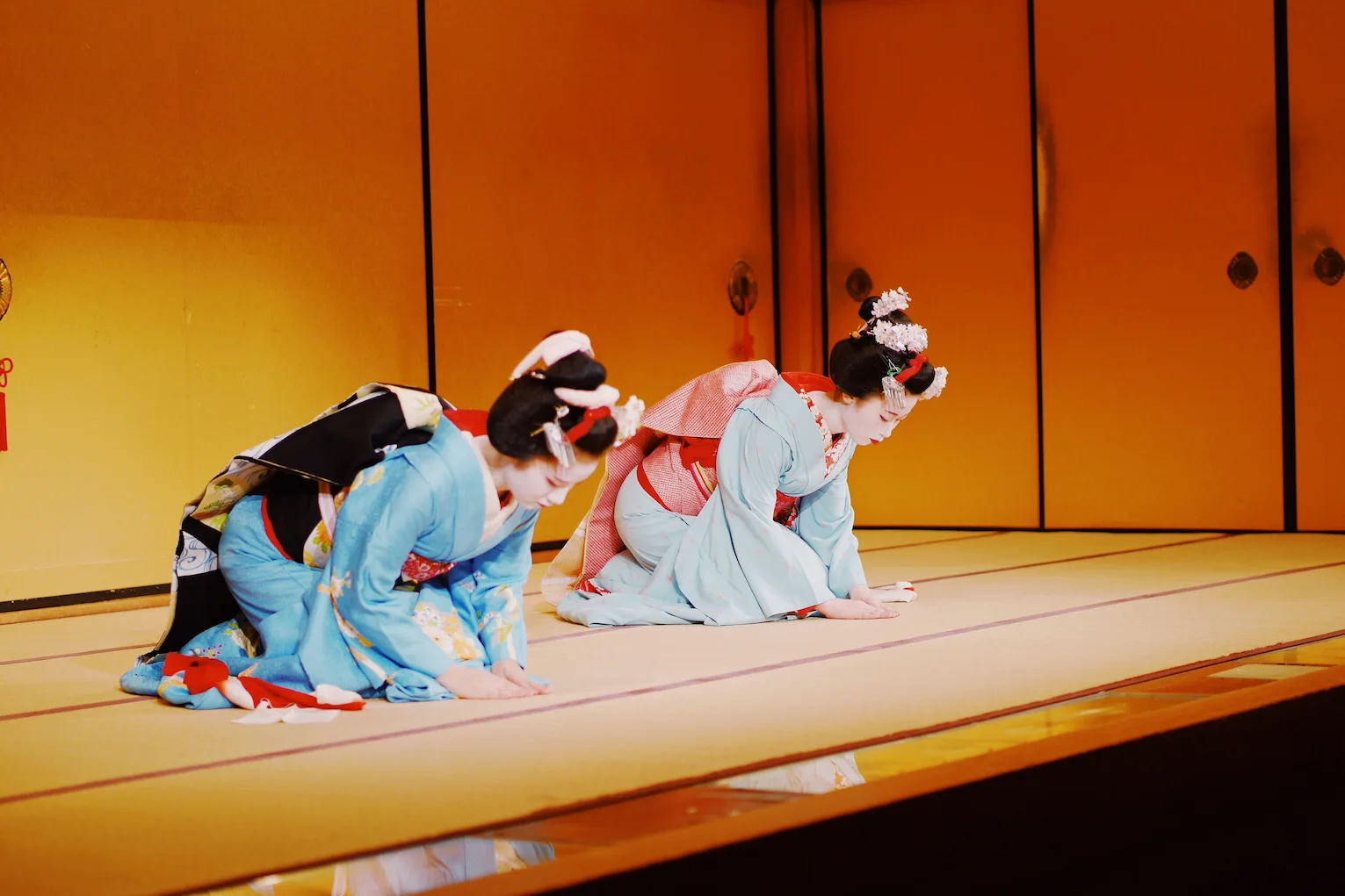 traditional geisha performing a classical Japanese dance